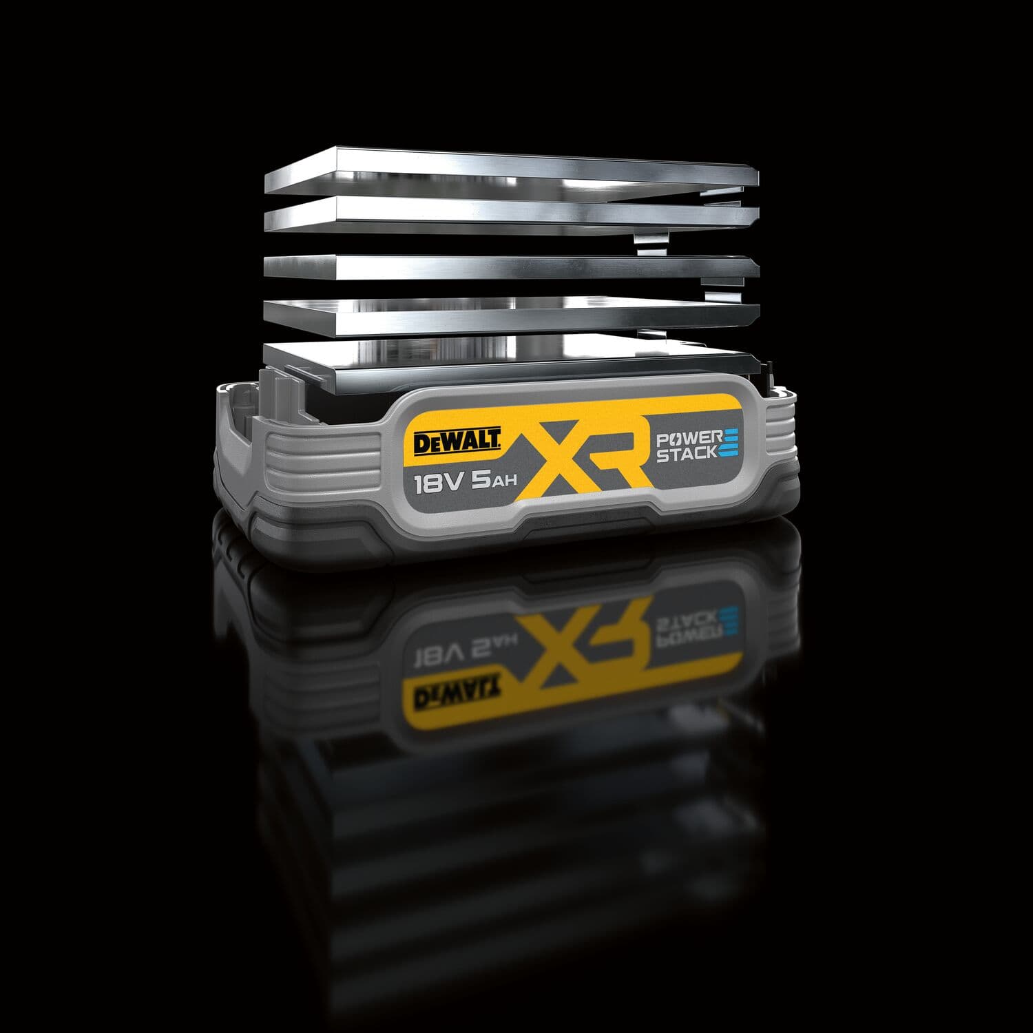 DEWALT XR PowerStack 18V 5Ah battery with metallic layers, placed on a reflective black surface.