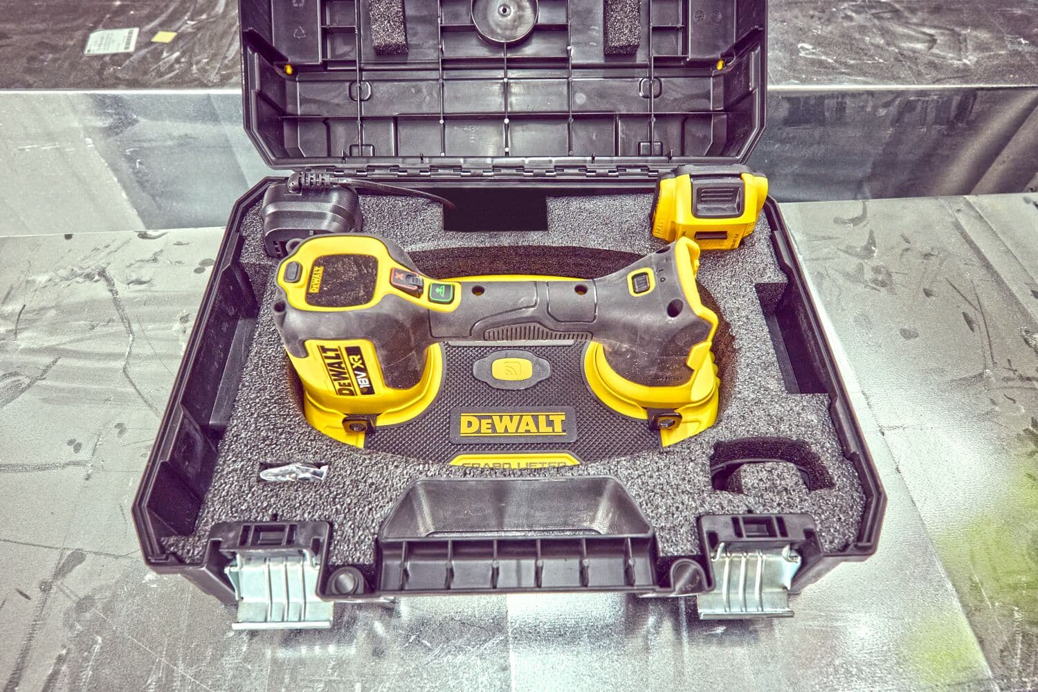 DEWALT DCE590 cordless tool in case, yellow and black, foam insert for protection.